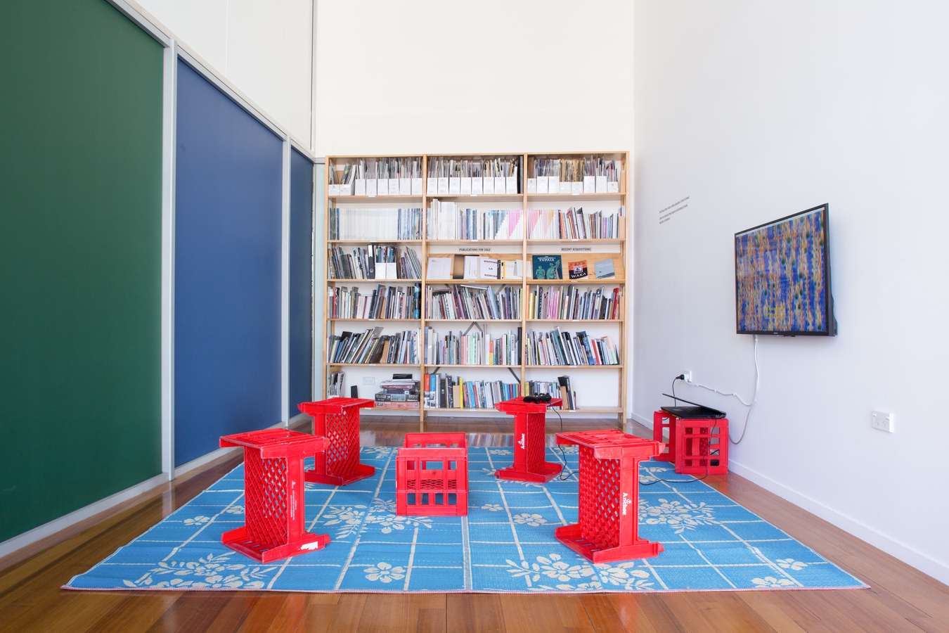 Image: Kahurangiariki Smith, FOB (installation view), 2016, video game, TV, controller, milk crates, mat. Interactive installation. Photo: Janneth Gil.