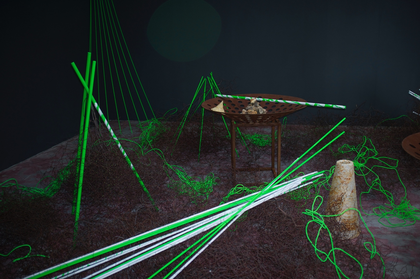 Cones of Possibilities & Impossibilities 2014 steel, rock, wood, paper, beeswax, cotton cord, flax, pohuehue (Muehlenbeckia complexa)Photo credit Pauline Rhodes