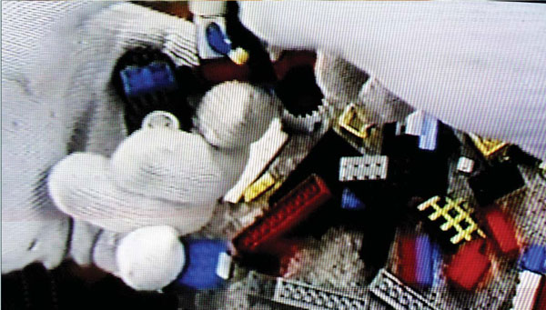 Mark Harvey Open Home Hamper (video still). 2002 The Physics Room Gallery