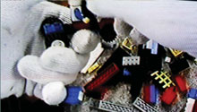 Mark Harvey Open Home Hamper (video still). 2002 The Physics Room Gallery